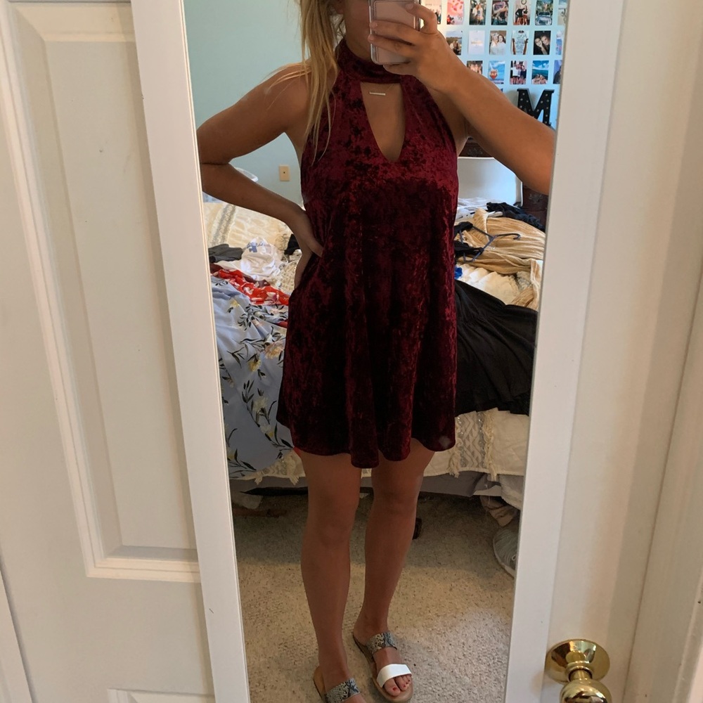 Red velvet material dress. Open back